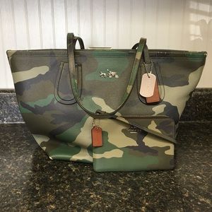 Coach camouflage taxi tote and wristlet.